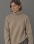 Women's beige oversized cashmere turtleneck jumper