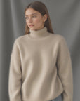 Women's beige oversized cashmere turtleneck jumper