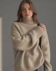 Women's beige oversized cashmere turtleneck jumper