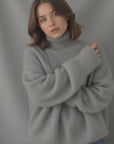 Women's beige oversized cashmere turtleneck jumper