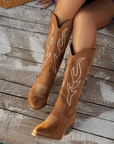 Women's knee-high cowboy boots in sand with western stitching and block heel