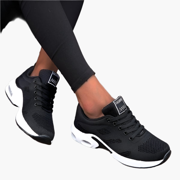 Women's orthopedic sneakers in pink and blue with cushioned supportive sole