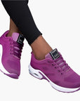 Women's orthopedic sneakers in pink and blue with cushioned supportive sole