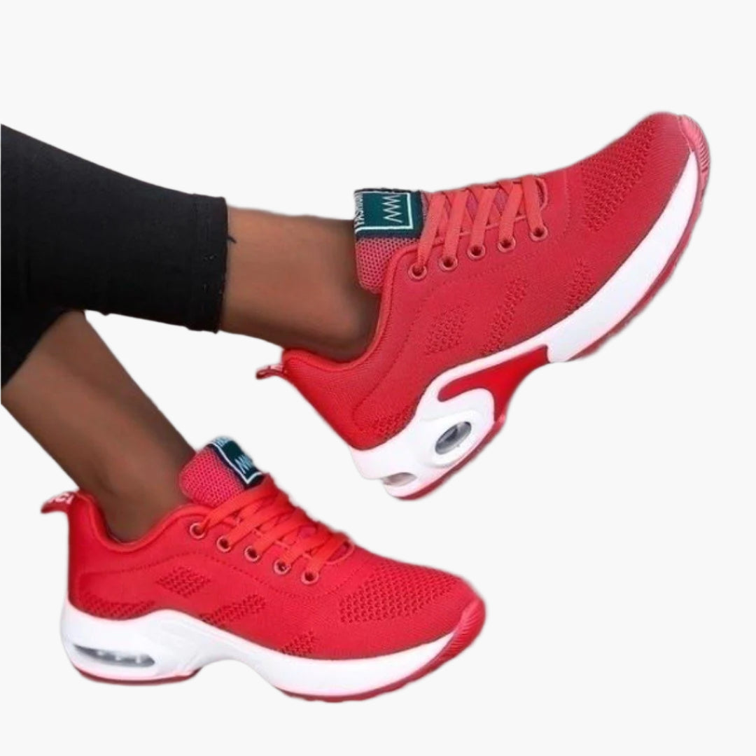 Women's orthopedic sneakers in pink and blue with cushioned supportive sole