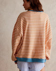 Women's oversized striped knit jumper in sky blue, relaxed fit, cosy winter knitwear