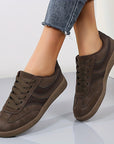 Women's vintage brown retro sneakers with low-top profile and cushioned insole