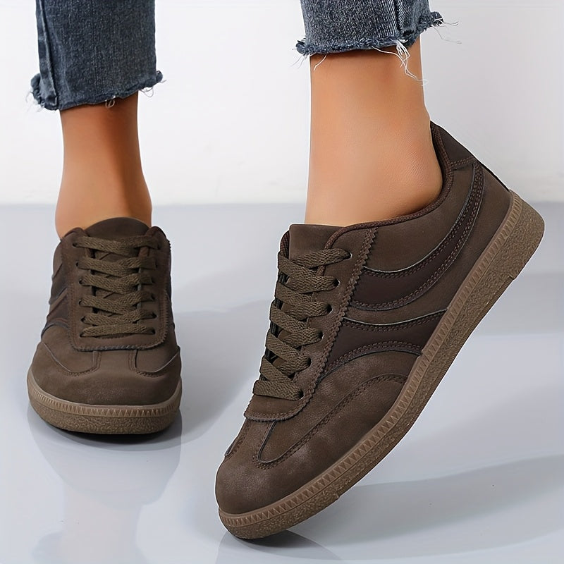 Women's vintage brown retro sneakers with low-top profile and cushioned insole