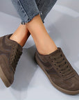 Women's vintage brown retro sneakers with low-top profile and cushioned insole