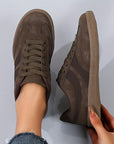 Women's vintage brown retro sneakers with low-top profile and cushioned insole