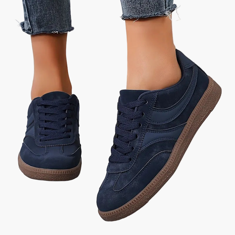 Women's vintage brown retro sneakers with low-top profile and cushioned insole