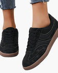 Women's vintage brown retro sneakers with low-top profile and cushioned insole
