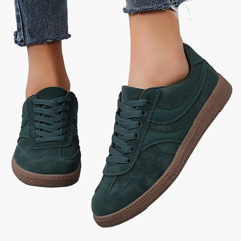 Women's vintage brown retro sneakers with low-top profile and cushioned insole