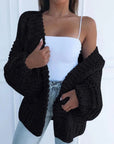 Women's black chunky knit cardigan open front