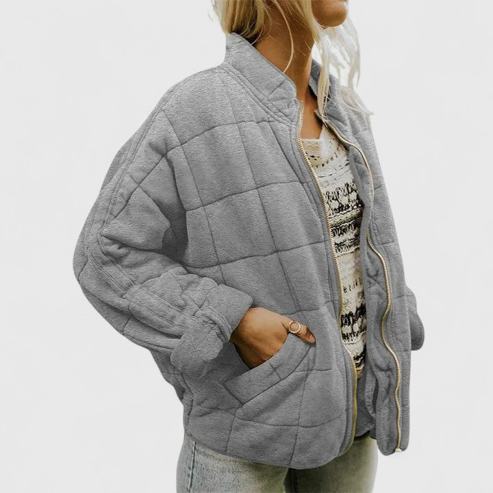 Women's green quilted lined jacket with relaxed fit